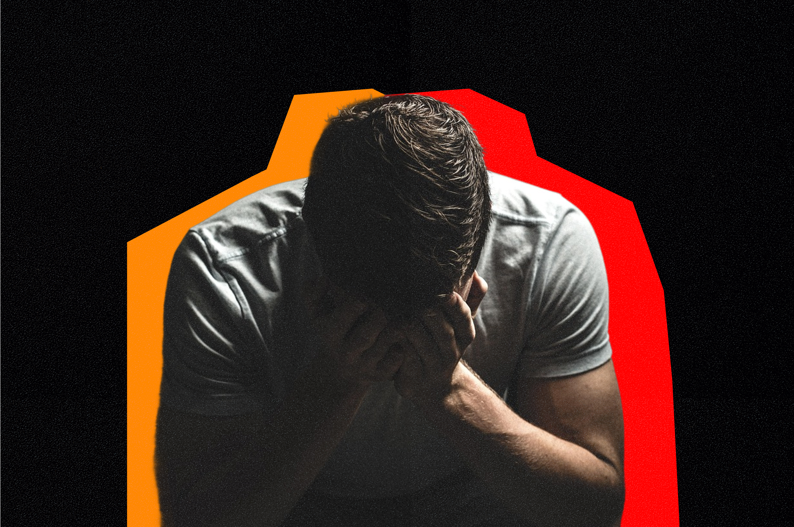 A hero image, showing a distressed man with his head in his hand, hunched over.
